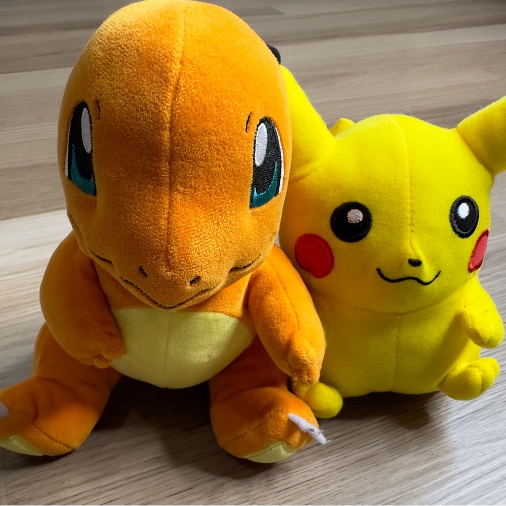 Pokémon Charmander and Pikachu small plushies